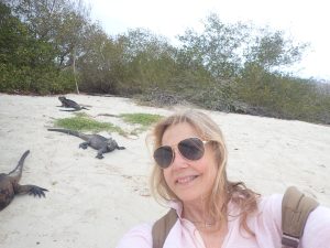 Me at Tortuga Bay Galapagos with the iguanas